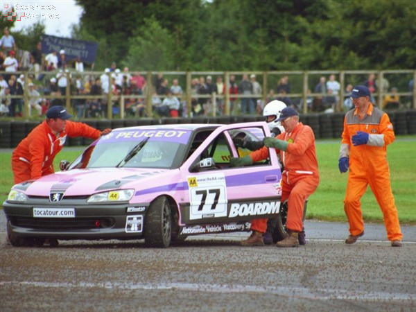 Marshals struggle with Boardman's stricken Peugeot