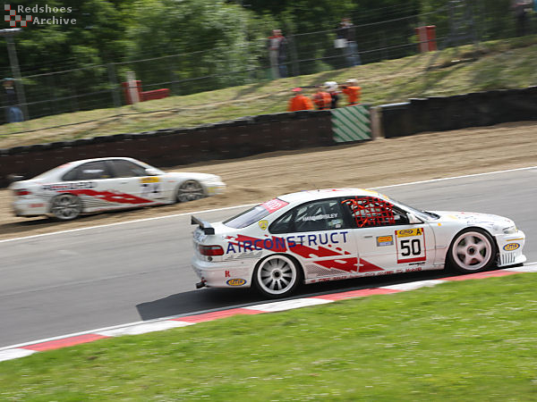 John Hammersley passes a stricken Stewart Whyte